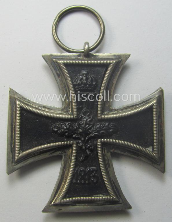 WWI-period: 'Eisernes Kreuz II. Klasse' (or: iron cross second class) being a (typical) non-maker-marked example that comes together with its (minimally) confectioned piece of ribbon (ie. 'Bandabschnitt')