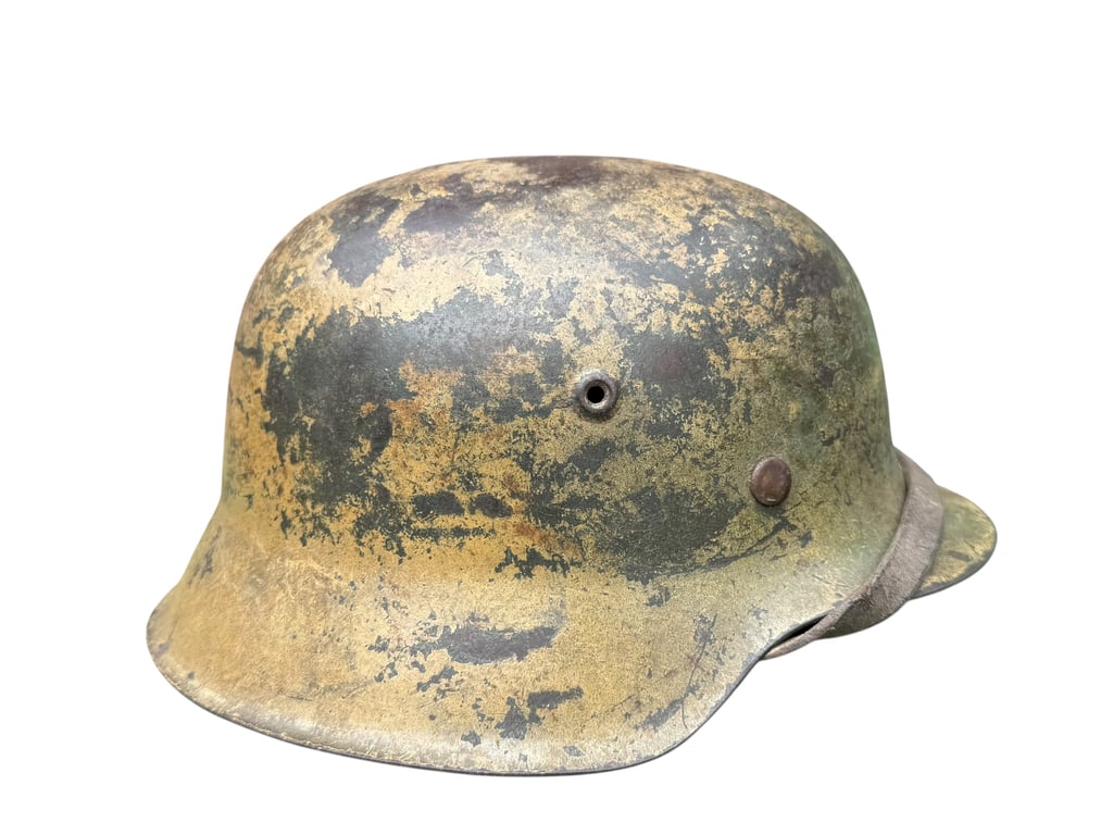 M42 Camouflage Helmet battle damage