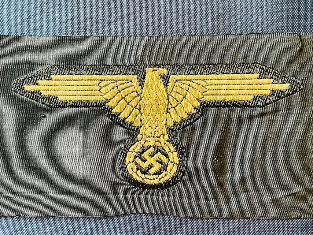 WWII GERMAN WAFFEN SS ARM EAGLE WITH SS PAPER ISSUED RZM TAG REMAINING.