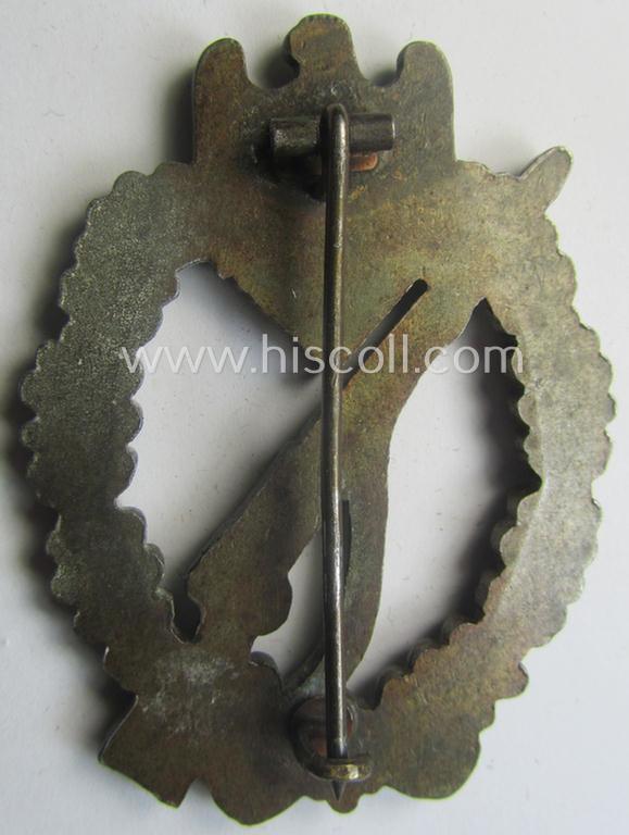 'Infanterie Sturmabzeichen in Bronze' (or bronze-class IAB) being a non-maker-marked, typical zinc- (ie. 'Feinzink'-) version ie. 'variant' as was (I deem) procuded by the: 'Funcke u. Brüninghaus'-company