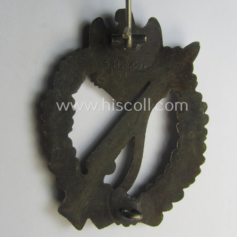 Superb - and very detailed! - 'Infanterie Sturmabzeichen in Bronze' (or: bronze-class infantry assault-badge ie. IAB) being a maker- (ie. 'S.H.u.C.o. 41'-) marked example as executed in bronze-toned, zinc-based metal (ie. 'Feinzink')