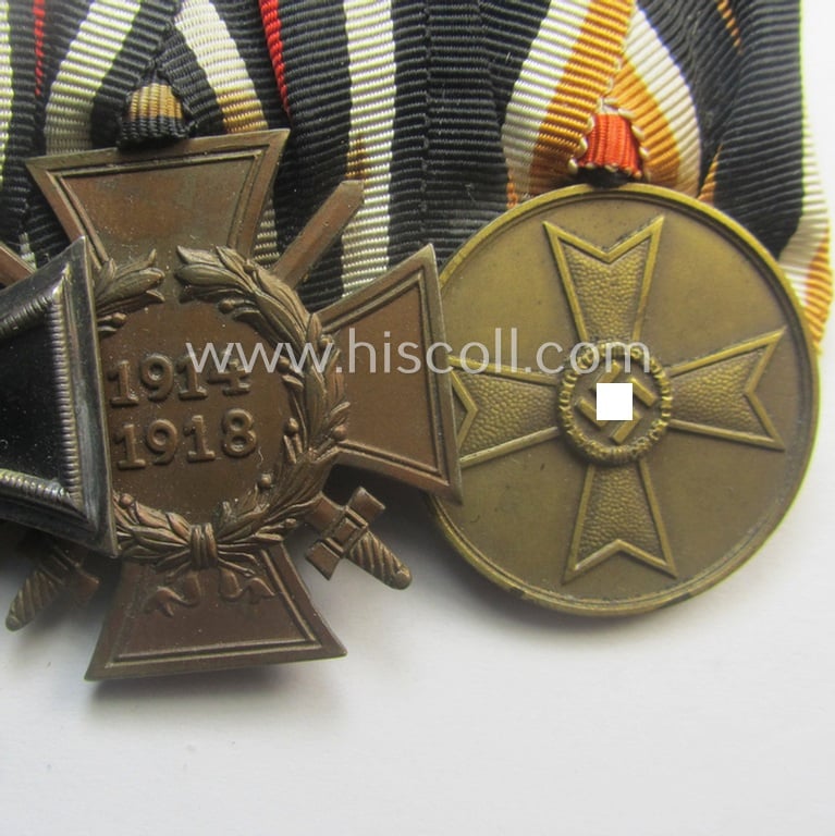 3-pieced, 'WWI'- (ie. TR-) related medal-bar (ie. 'Ordenspange') resp. depicting a WWI-period: 'EK II.Kl.', a: 'FKK 1914-18 mit Schwn.' and a: 'Kriegsverdienstmedaille 1939'