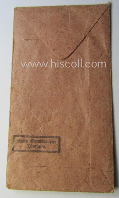 Empty 'Zellstoff'-based pouch as was intended for a medal: 'Winterschlacht im Osten 1941/42' as was produced by the: 'Eugen Schmidthaussler'-company (ie. 'Hersteller 28')