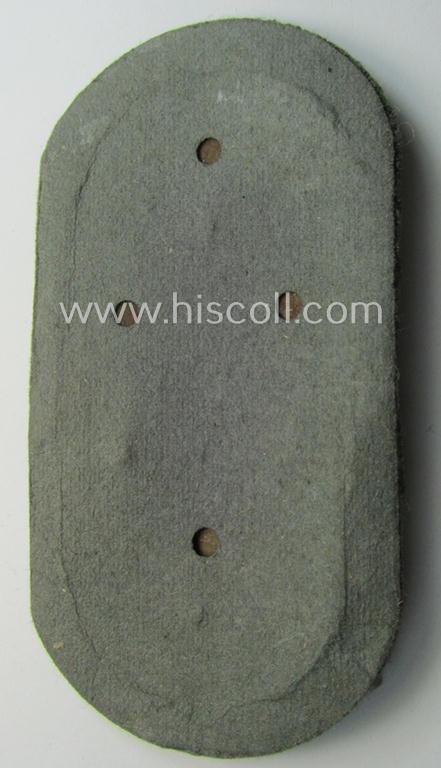 Superb example of a - fairly scarcely encountered! - WH (Heeres ie. Waffen-SS) 'Demjansk'-campaign-shield as executed in typical magnetic, so-called: 'Eisenblech' (and being of the 'missing-log' variant-pattern)