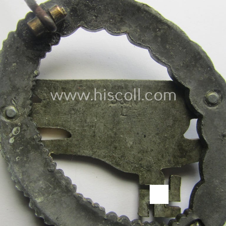 WH (Luftwaffe) 'Fallschirmschützen-Abzeichen' (or: paratroopers-jumpbadge) being a maker- (ie. 'B&N - L'-) marked- and typical zinc- (ie. 'Feinzink'-) based example by: 'Berg u. Nolte'