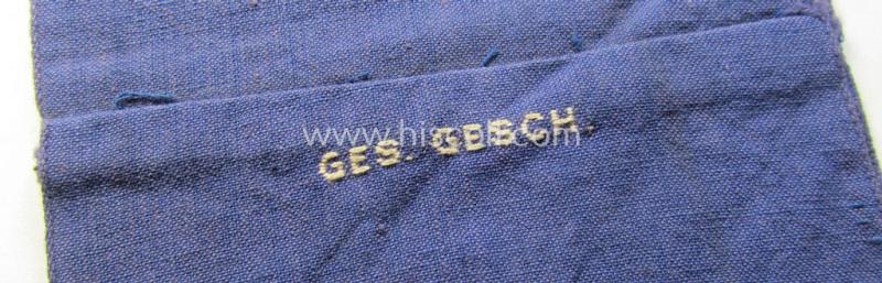 RLB (or: 'Reichsluftschutzbund') 'Amtsträger'-armband depicting the typical 'RLB'-logo (with lettering) and showing an interwoven 'Ges.Gesch.'-patent-pending-designation