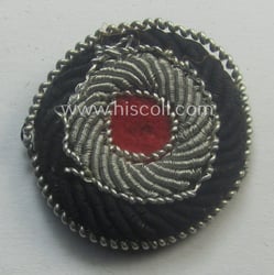 Neatly hand-embroidered - and carefully cap-removed! - WH...