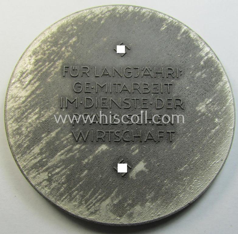 Larger-sized- and silver-toned, so-called: award-plaque (or: 'Erinnerungs- o. nichttragbare Medaille') showing 3 figures and that is entitled: 'Für langjährige Mitarbeit im Dienste der Pfälzischen Wirtschaft' and that comes stored in its period-e...