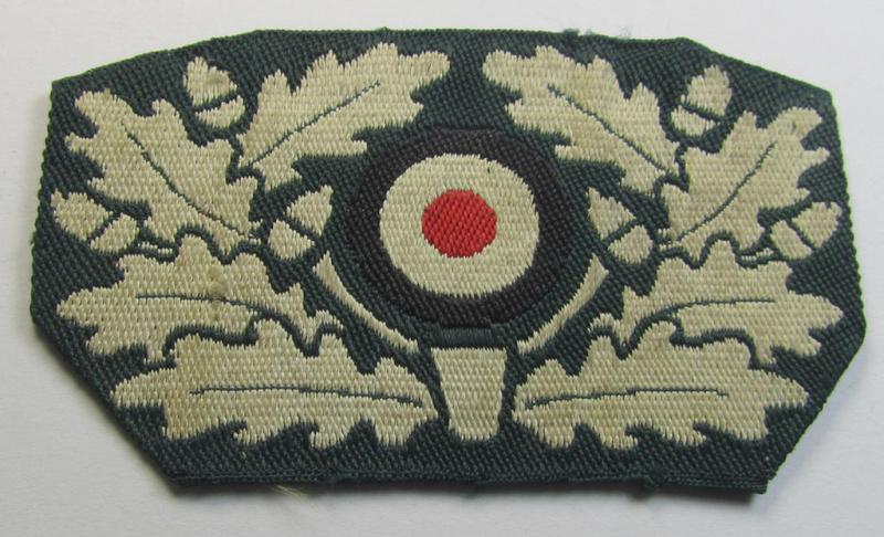 Attractive - albeit clearly used- and/or carefully cap-removed! - WH (Heeres) 'BeVo'-woven cap-cocarde (ie. wreath or: 'Schirmmützenkokarde') as was intended for usage on the 'old-style' visor-caps (or: 'Knautsch- o. alter Art Schirmmützen')