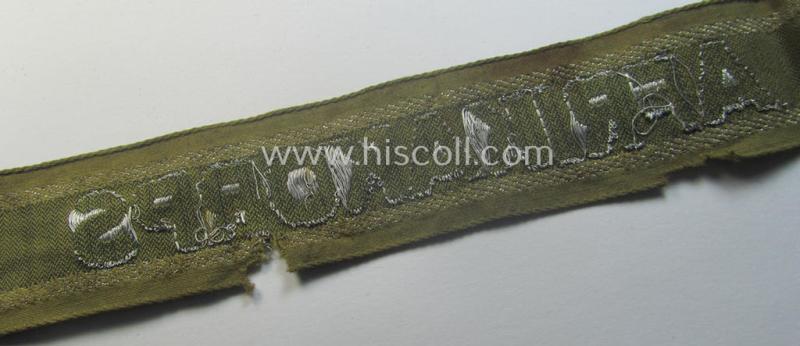 Relic, 'BeVo'-like cuff-title (ie. 'Ärmelstreifen') entitled: 'Afrikakorps' being a clearly issued and/or worn example that comes in an overall nice- (ie. hardly shortened- albeit somewhat damaged-), condition