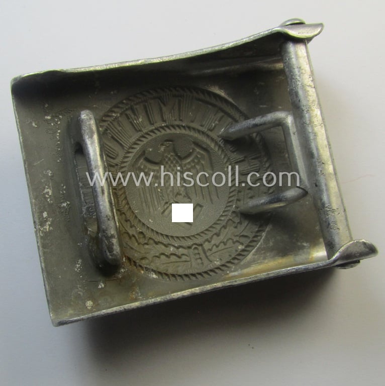 Truly used and/or worn, WH (Heeres) aluminium-based belt-buckle (ie. 'Koppelschloss für Uffz. u. Mannschaften des Heeres') being a maker- (ie. 'GB' or: 'Gustav Brehmer'-) marked example