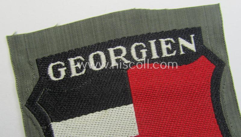 Attractive, 'BeVo'-type armshield entitled: 'Georgien' (being a 'virtually mint- ie. unissued' example as intended for a volunteer who served within the 'Deutsche Wehrmacht' ie. within the 'Georgisches Legion')