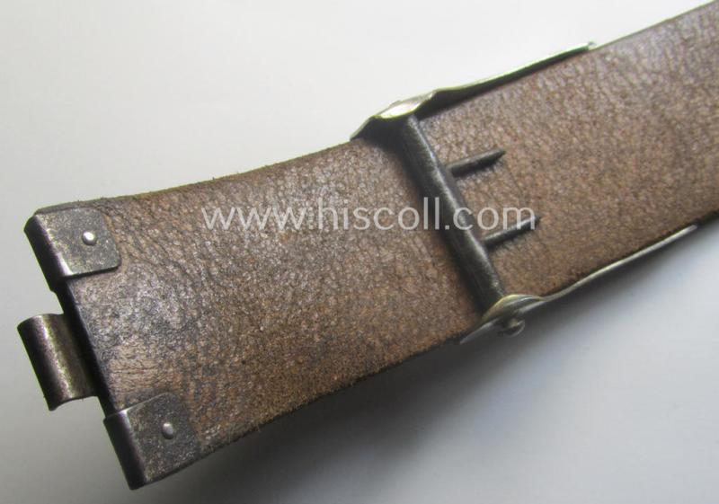 Complete(!) DJ (ie. 'Deutsches Jungvolk') silver-coloured- (ie. typical nickle-chromed) belt-buckle (ie. 'Koppelschloss') being a maker- (ie. 'RzM U.E. 72'-) marked example that comes mounted onto its (nicely marked), leather-based belt