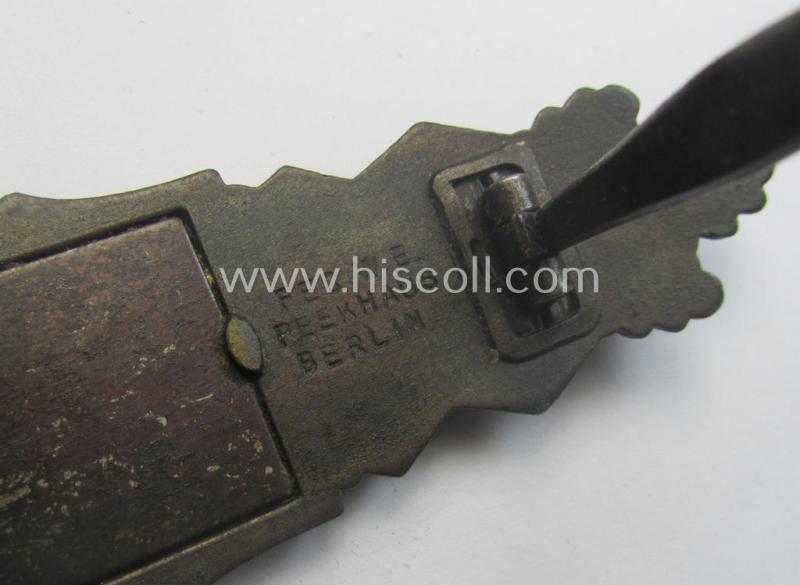 'Nahkampfspange in Bronze' (or: bronze-class close-combat clasp ie. CCC) being a neatly maker-marked- and/or minimally converse-shaped specimen as was produced by the: 'JFS'- (ie. 'Joseph Feix u. Söhne'-) company