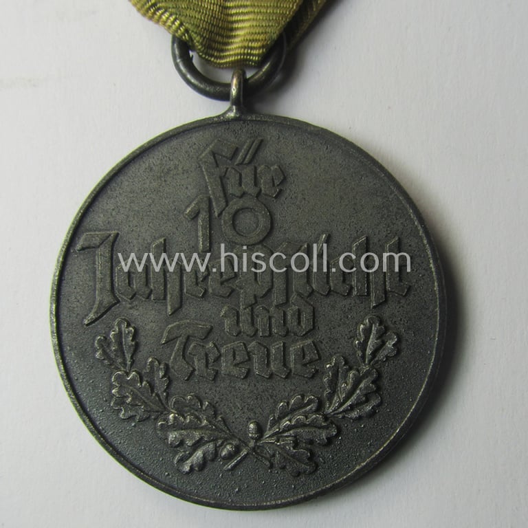 Silverish-grey-toned, typical 'Reichsnährstand'- (ie. 'RNSt.'-) related, (portable) loyal-service-award entitled: 'Reichsnährstand - Landesbauernschaft Ostpreussen - Für 10 Jahre Pflicht und Treue'