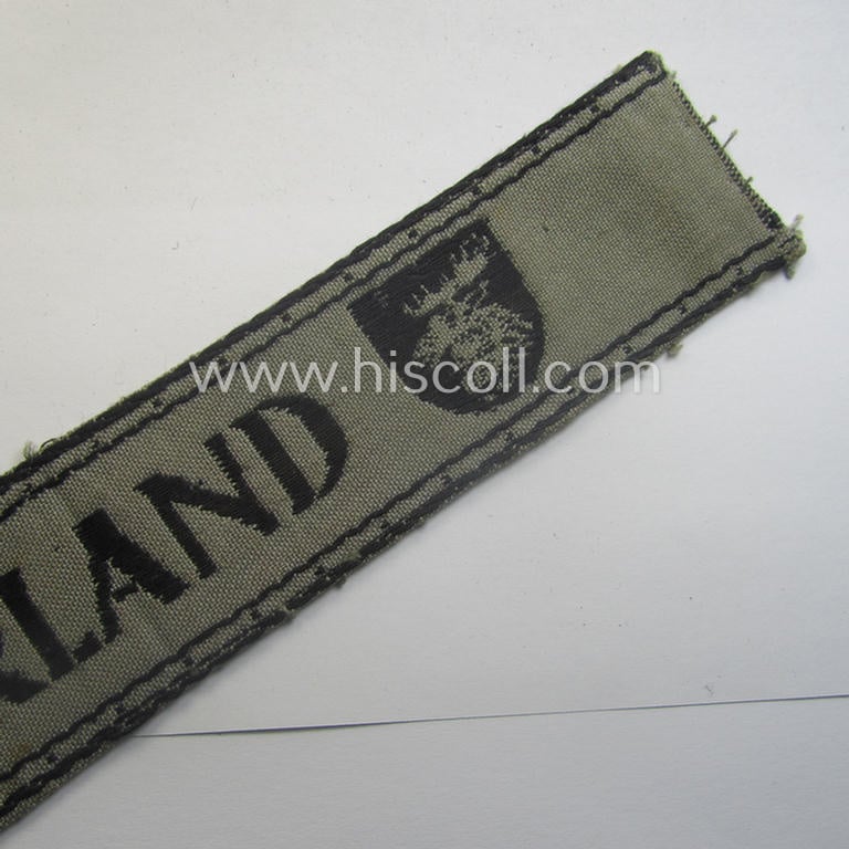 WH (Heeres ie. Kriegsmarine) cuff-title- ie. armband (ie. 'Ärmelstreifen') entitled: 'Kurland' that comes in an overall very nice- (albeit clearly used- ie. tunic-removed-), condition