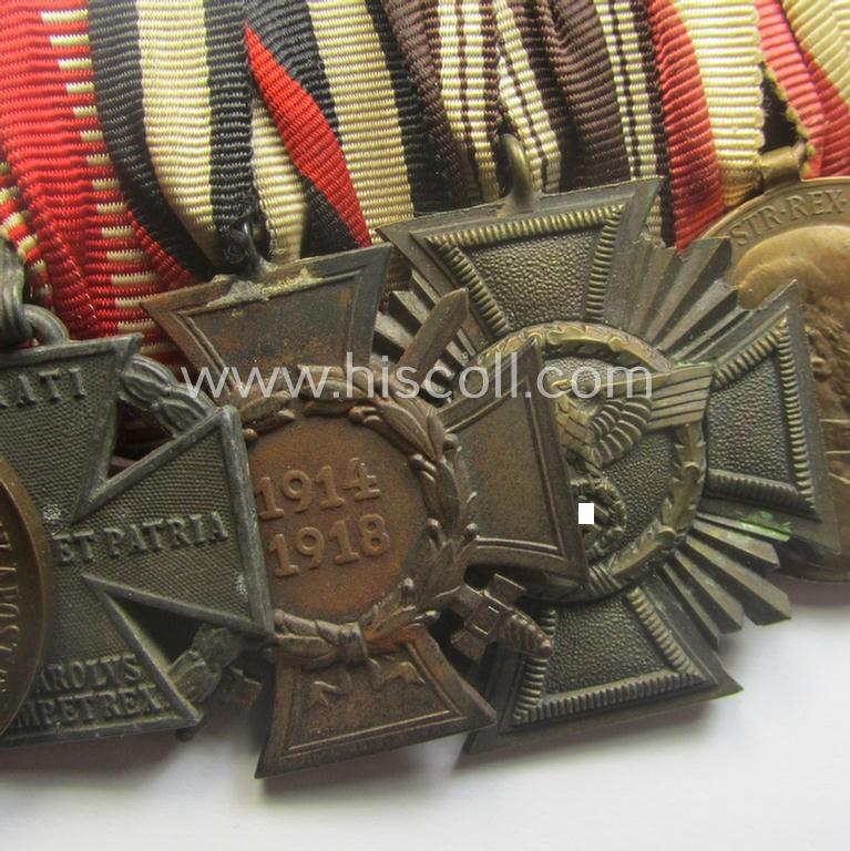 Unusually seen, 8-pieced WWI- (ie. TR- ie. N.S.D.A.P.-) related 'Ordenspange' showing amongst others: an 'N.S.D.A.P-D.A. in Bronze' (ie. '3. Stf. für 10 Jahre t.D.') and various WWI-period Austrian-(Hungarian) awards