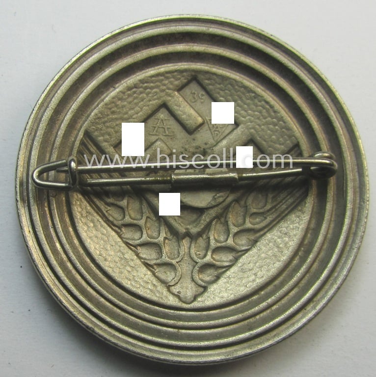 'Reichsarbeitsdienst der weiblichen Jugend' (or: RADwJ ie.: Womens Labor Service) so-called: 'Brosche für Kameradschaftsältesten' being a clearly maker- (ie. 'A'-) marked and/or: '1939'-dated example