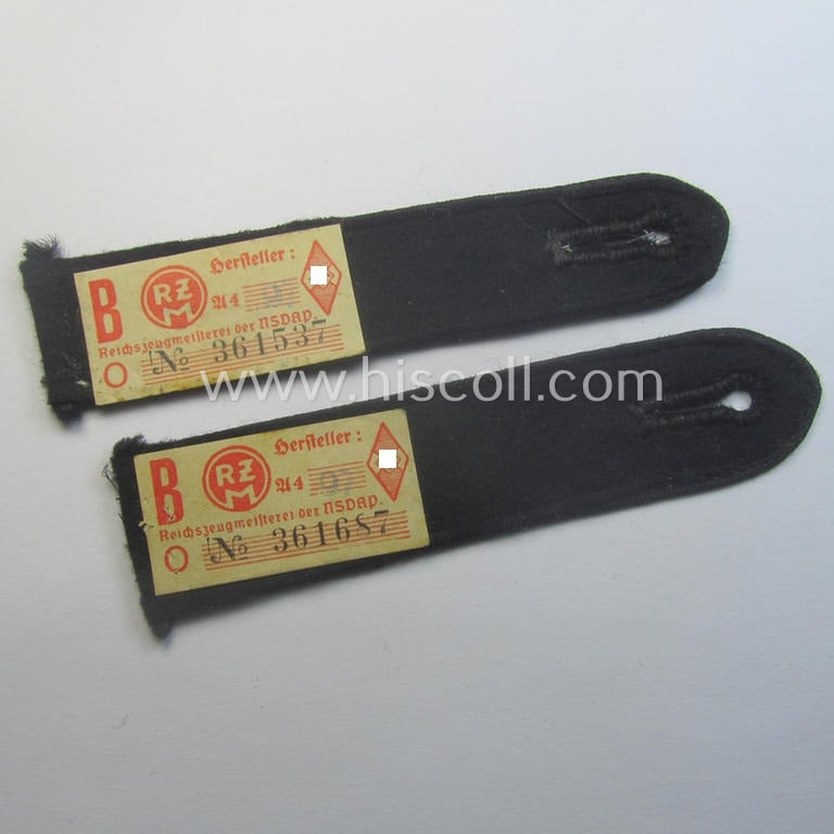 Attractive - and naturally single! - so-called: 'DJ- o. Deutsches Jungvolk' shoulderstrap as was intended for usage by a: 'DJ-Mitglied' serving within the: 'Bann 539' (539 = 'Vöcklabruck') and that still shows its period-attached, 'RzM'-etiket