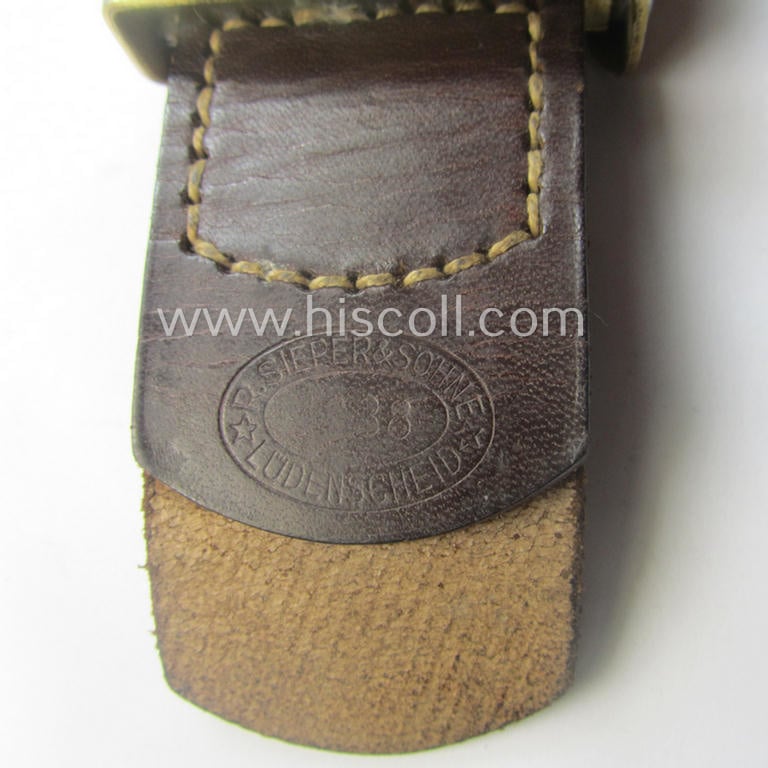 Stunning, WH (Kriegsmarine) bright-golden-toned- and/or aluminium-based belt-buckle (being a maker- ie.: 'R.S.&S.'-marked (and '1938'-dated!) example that comes mounted onto its leather-based tongue