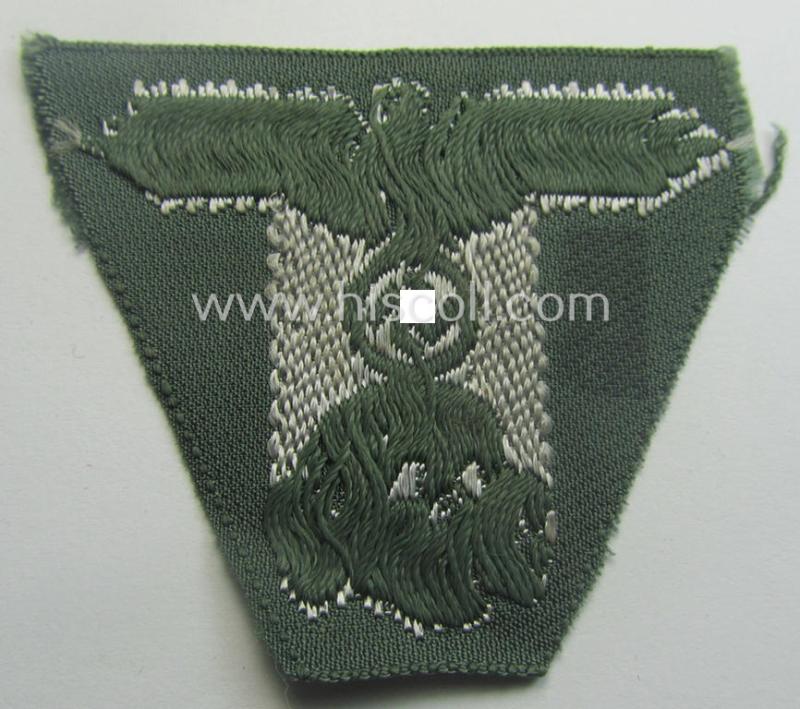 Waffen-SS field-grey-coloured, M43-pattern cap-trapezoid as was intended for usage on the M43-model field-caps (ie. 'Einheitsfeldmützen') that comes in an overall nice- (albeit minimally damaged-), condition