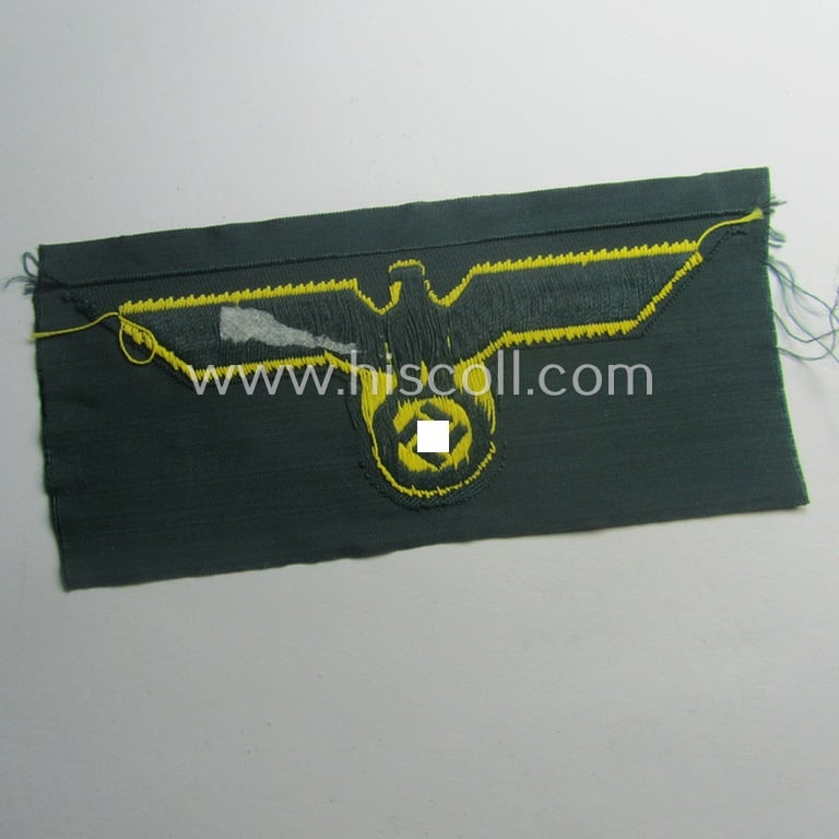 WH (Kriegsmarine) ie. 'Küsten-Art.'-related breast-eagle (ie. 'Brustadler für Mannschaften u. Uffz. der Küsten-Artillerie-Truppen') being a 'standard-pattern-example as executed in the 'BeVo'-weave-pattern on a darker-green-coloured background