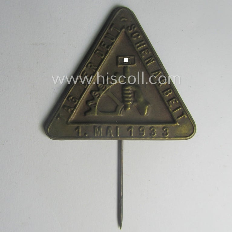 Unusually seen, commemorative D.A.F.- (ie. N.S.B.O.-) related day-badge (ie. 'tinnie') as issued to commemorate a specific D.A.F. (ie. N.S.B.O-) related gathering simply named the: 'Tag der Deutsche Arbeit - 1. Mai 1933'