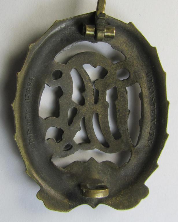 Attractive - and I deem just moderately worn- ie. used! - 'Reichssportabzeichen DRL in Bronze' (or: DRL sports'-badge in bronze) being an example that is nicely maker- (ie. 'Wernstein - Jena'-) marked on its back