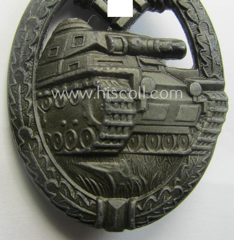 'Panzerkampfabzeichen in Bronze' (or: bronze-class panzer assault badge or PAB) being a zinc- (ie. 'Feinzink'-) version (of the so-called: 'early-period, hollow-zinc, Type A'-variant) as was procuced by the: 'Wilhelm Deumer'-company