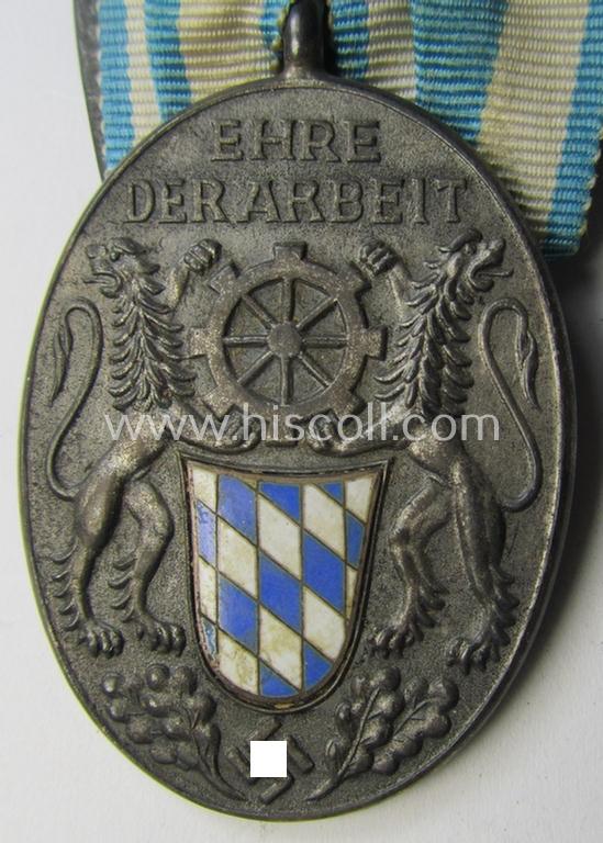 Silver-toned - and/or partly enamelled! - so-called: 'Einzelspange' showing a Third Reich-period: 'Treuedienstabzeichen der Bayerischen Industrie' (as was intended for 25 years of loyal-service) and that is entitled: 'Ehre der Arbeit'