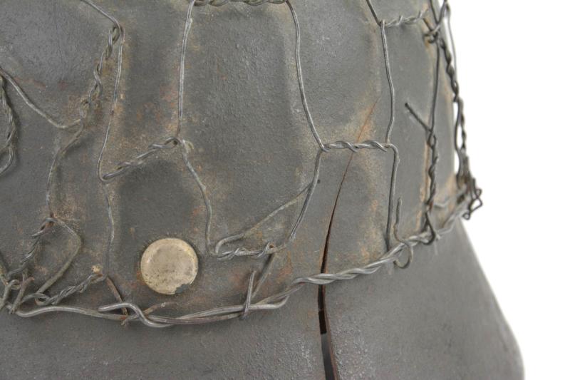 German WH M40 SD Combat Helmet with Battle damage and Half Wire Basket