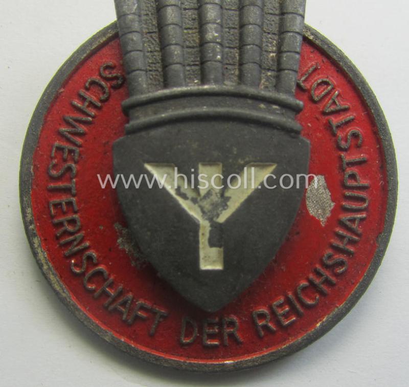 Very unusual - and rarely encountered! - DRK nurses'-badge entitled: 'Schwesternschaft der Reichshauptstadt' being a multi-piece-contructed example showing a low bearers'-number: ('C1426') and/or makers'-designation ie. logo ('Lauer')
