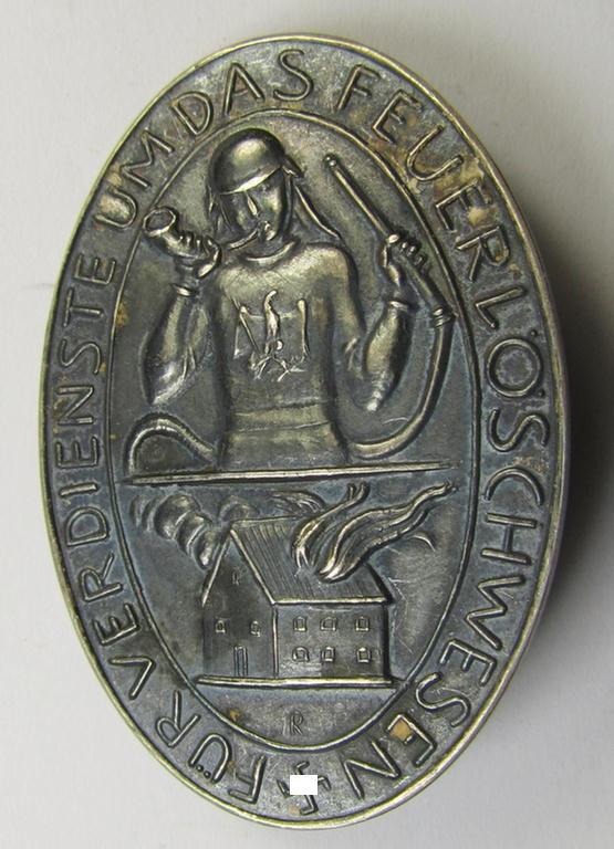 Pre-war-period- and/or silver-based (ie. '900'-stamped), so-called: 'Erinnerungszeichen Verdienste um das Feuerlöschwesen 1934' being a very detailed- and maker- (ie. 'Preuss. Staatsmünze'-) marked, example that comes stored in its period etui