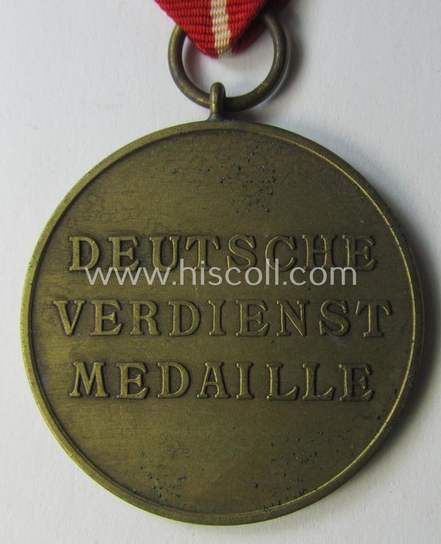 'Deutsche Bronzene Verdienstmedaille des Deutschen Adler Ordens ohne Schwn.' being a '30'-marked example
