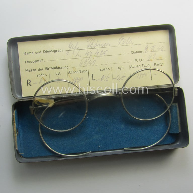 Complete pair of 'standard-issued'-pattern, WH-service-glasses (ie. 'Dienstbrille') as issued to the: 'Gefr. Peter Thönes' (or alike) serving within the 'Truppenteil': 'L47425' and that comes stored in its period-container