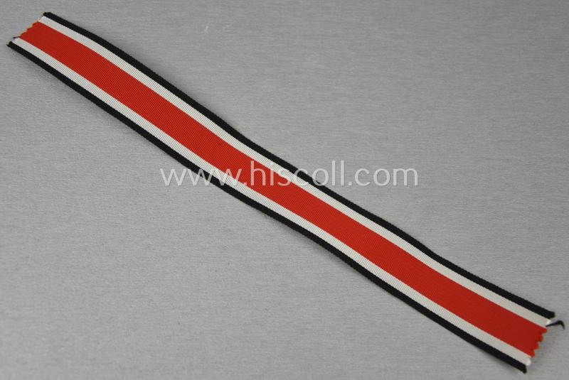 Neat spare-part: a non-confectioned- (ie. full length- ie. 29 cms. long-sized-) ribbon (ie. 'Bandabschitt') as was intended for the: 'Eisernes Kreuz II. Klasse' and that comes in an overall very nice- (ie. 'virtually mint ie. unissued'-), condi...