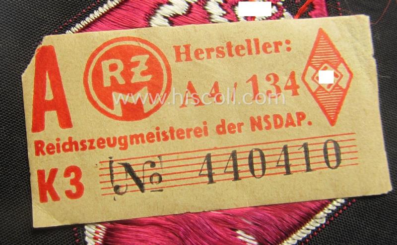 HJ ('Hitlerjugend') 'Feuerwehr Formationsabzeichen' (or: youth fire-fighter badge ie. 'Raute') as neatly executed in 'BeVo'-weave pattern and that still shows its period-attached 'RzM'-etiket