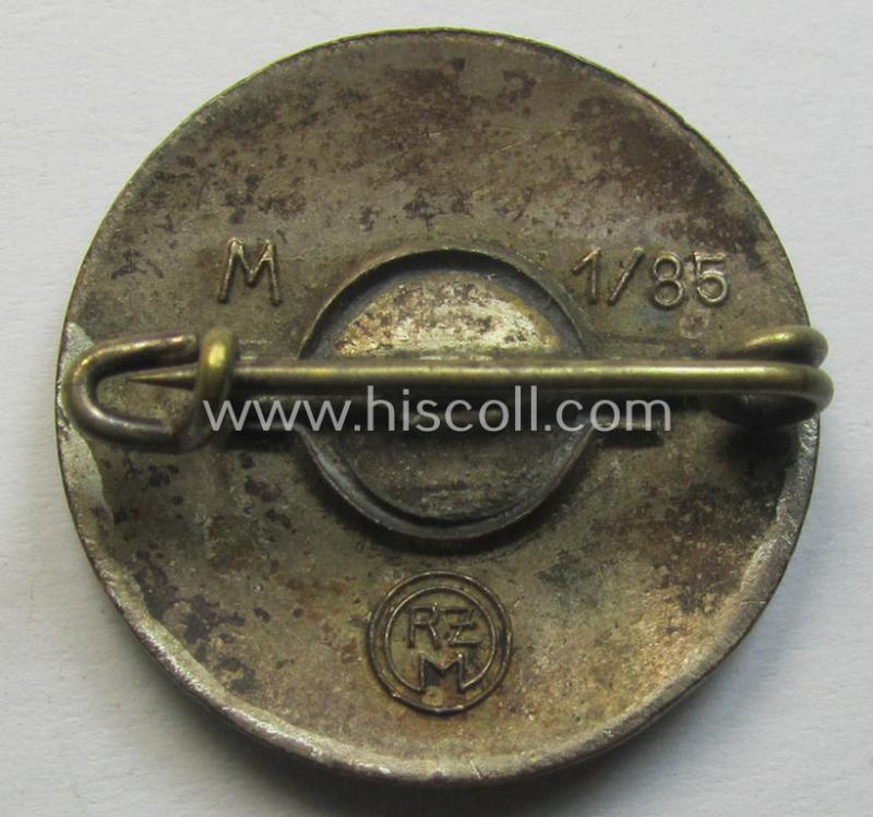 Neat - bright-red-coloured and nicely preserved! - 'N.S.D.A.P.'-membership-pin- ie. party-badge (or: 'Parteiabzeichen') which is maker-marked on its back with the makers'-designation: 'RzM' and/or: 'M1/85'