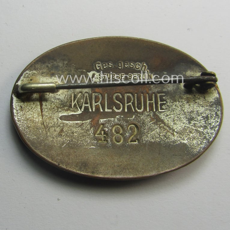 Attractive - and rarely seen! - DRK (ie. 'Deutsches Rotes Kreuz'): nurses'-badge entitled: 'Schwesternschaft' being an oval-shaped- and/or maker-marked specimen showing an engraved bearers'-number: ('482') and towns'-name: 'Karlsruhe'