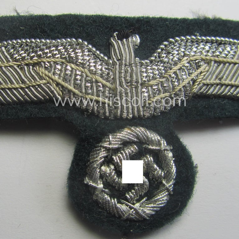 Superb, WH (Heeres) officers'-pattern visor-cap-eagle (ie. 'Adler für Offiziers-Schirmmütze') being a neatly hand-embroidered example of the: 'Extra Qualität'
