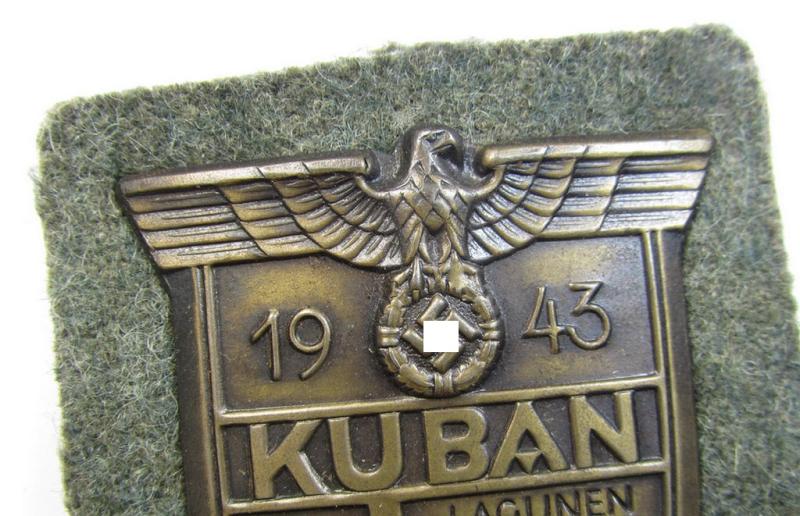 Very attractive - and actually scarcely encountered! - WH (Heeres ie. Waffen-SS) 'Kuban'-campaign-shield that comes mounted onto its original field-grey-coloured- and/or woolen-based 'backing'
