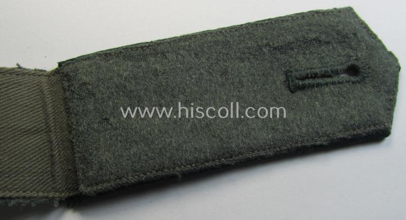 Single - and actually not that often seen! - WH (Heeres) EM-type (ie. 'M36-/M40'-pattern- and 'pointed styled-') 'cyphered' shoulderstrap as was intended for usage by a: 'Soldat des Artillerie-Regiments 34'