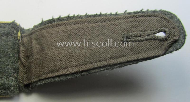 Single, mid-war-period, so-called: 'M43'-pattern, WH (Heeres) NCO-type shoulderstrap as piped in the bright-yellow-coloured branchcolour as was intended for usage by an: 'Uffz. der Nachrichten-Trpn.'