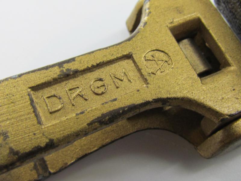 Leather shoulder strap marked DRGM