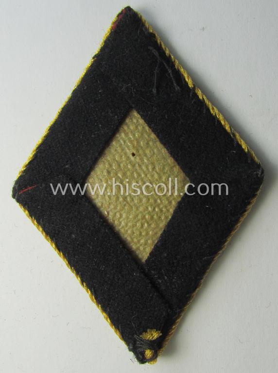 Attractive - and truly rarely encountered! - neatly hand-embroidered 'N.S.D.A.P.'-related sleeve-diamond (ie.: 'Ärmelraute') entitled: 'AO', as was specifically worn by the members within the: 'N.S.D.A.P.-Auslandorganisation'