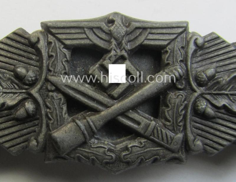 Attractive, 'Nahkampfspange in Bronze' (or: bronze-class close-combat clasp ie. CCC) being a maker- (ie. 'FLL'-) marked, so-called: '3rd pattern'-specimen as was produced by the maker- (ie. 'Hersteller') 'Friedrich Linden'