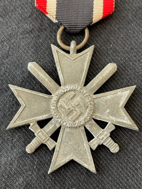 GERMAN WWII WAR MERIT CROSS 2nd CLASS WITH SWORDS NUMBERED RING 45 PRODUCED BY JULIUS BAUER SOHNE.