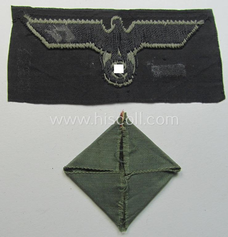 Superb, later- (ie. mid-) war-period, WH (Heeres) 'Panzer' side-cap- (ie. 'Schiffchen') eagle and dito cocarde both pieces as executed in greyish-blue-coloured linnen onto a black-coloured (and also linnen-based) background