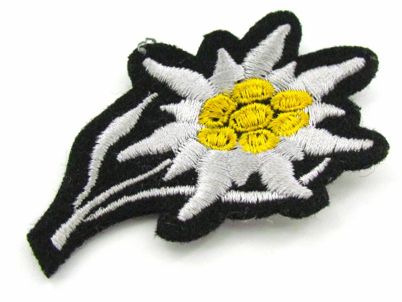 Waffen SS 'Gebirgsjäger' Edelweiss cloth cap badge