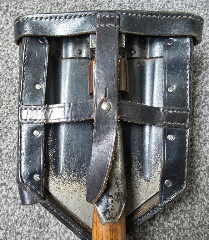 Wehrmacht Folding Shovel in 1st pattern carrier.